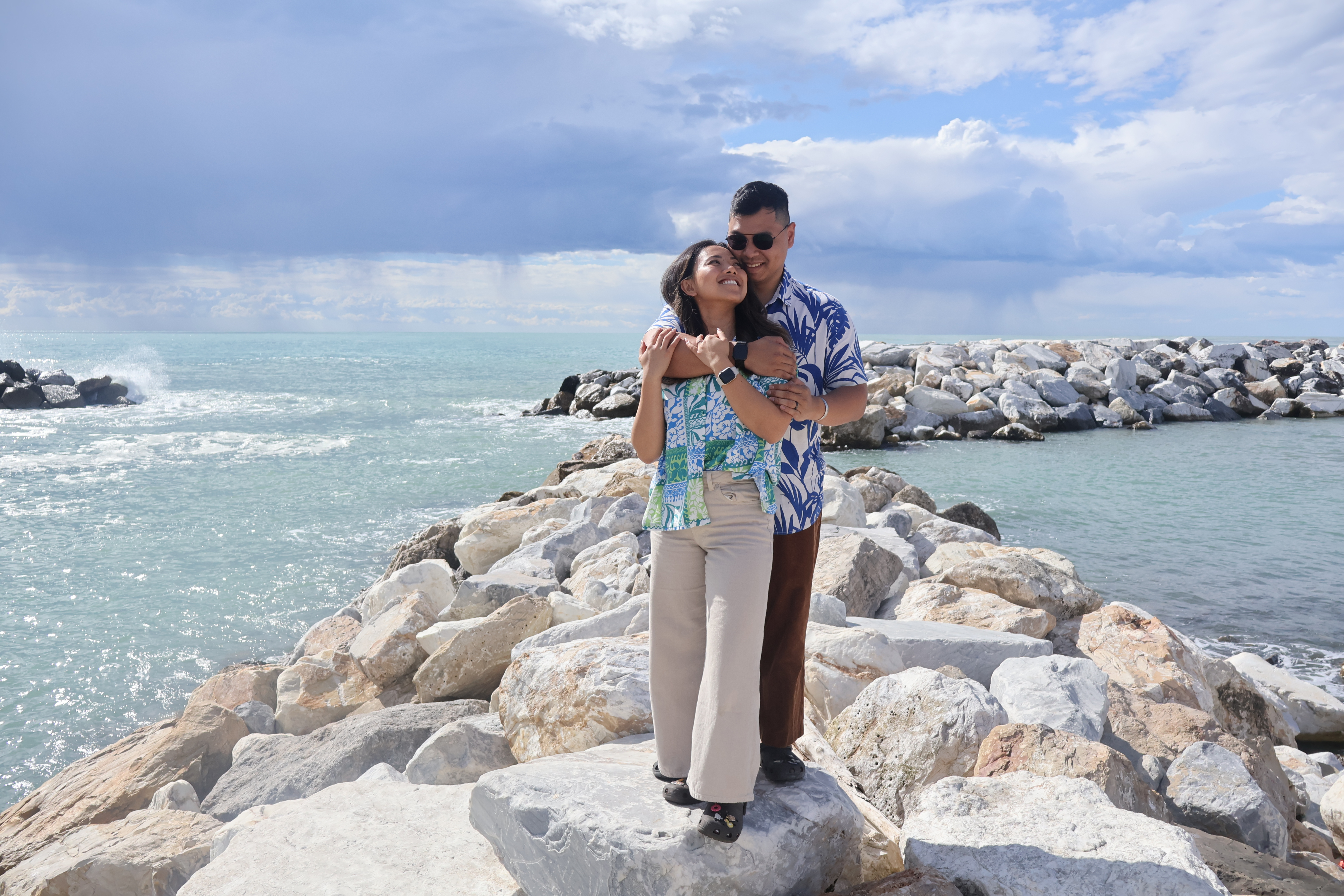 A image of a concrete sphere, balanced between two other larger spheres